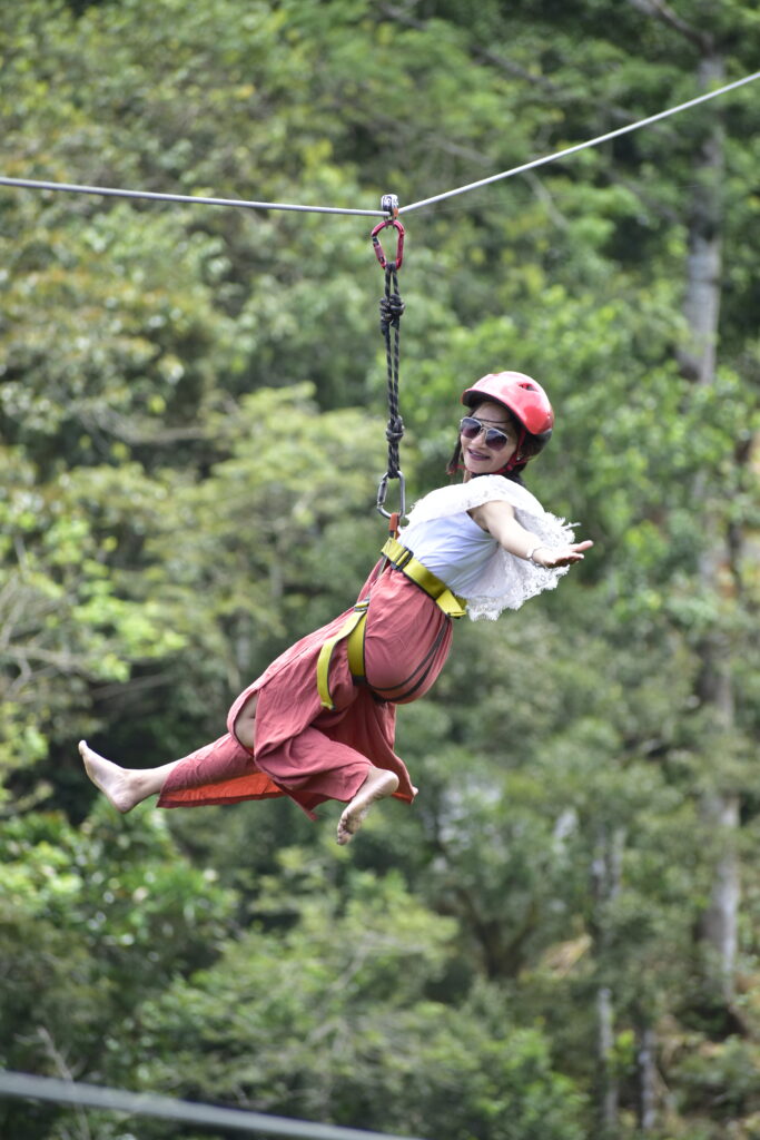 Vagamon zipline photos with panoramic valley and lake background